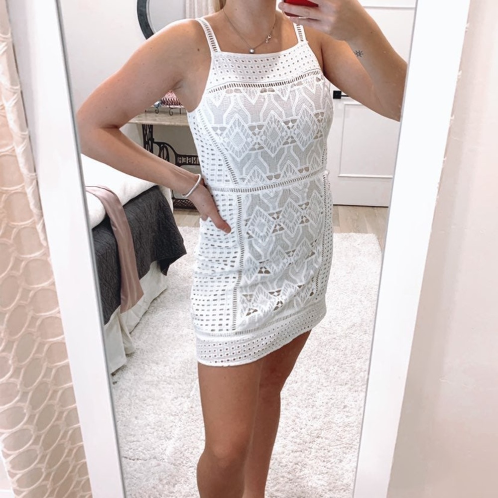 New white tight fitted mini dress